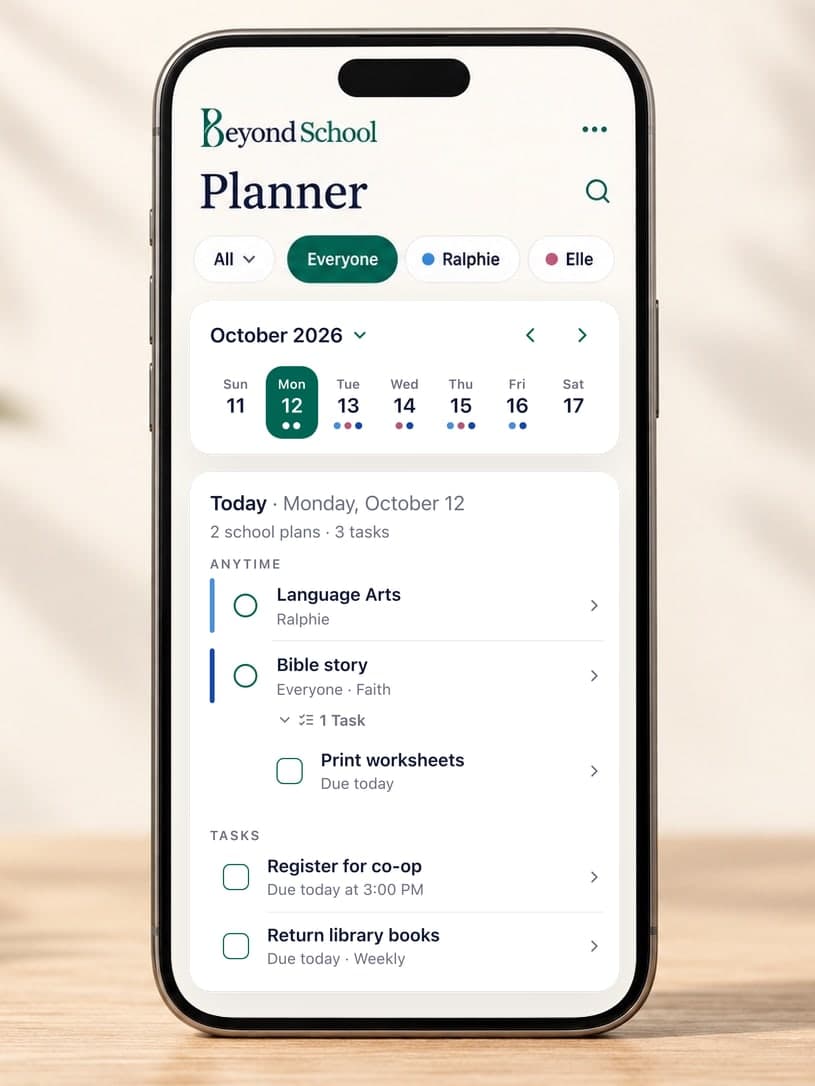 The BeyondSchool Planner on a phone, showing the week of October 12. Today’s plans are Language Arts for Ralphie and a Bible story for everyone, with a task under it to print worksheets. Below them are two more tasks: register for co-op by 3:00 PM, and return library books, which repeats weekly.